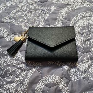 Brand new never used clip on wallet and beaded ring